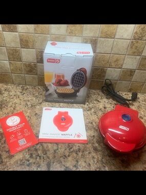 “Dash” Mini Waffle Maker. Color: Red.